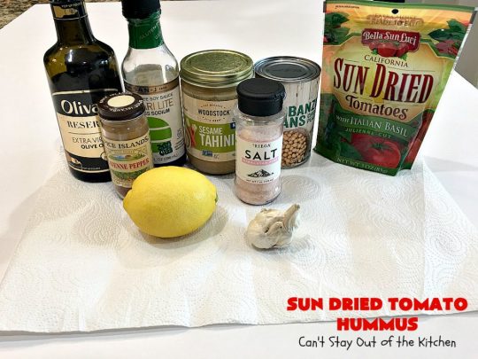 Sun Dried Tomato Hummus | Can't Stay Out of the Kitchen | this #hummus #recipe is fantastic! It includes #SunDriedTomatoes & just a little heat from cayenne pepper. This amazing #appetizer is healthy, low calorie, #GlutenFree & #vegan. Plus it can be whipped up in about 5 minutes! #tailgating #GarbanzoBeans #SunDriedTomatoHummus