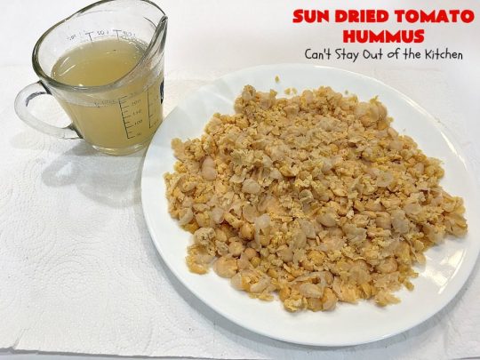 Sun Dried Tomato Hummus | Can't Stay Out of the Kitchen | this #hummus #recipe is fantastic! It includes #SunDriedTomatoes & just a little heat from cayenne pepper. This amazing #appetizer is healthy, low calorie, #GlutenFree & #vegan. Plus it can be whipped up in about 5 minutes! #tailgating #GarbanzoBeans #SunDriedTomatoHummus