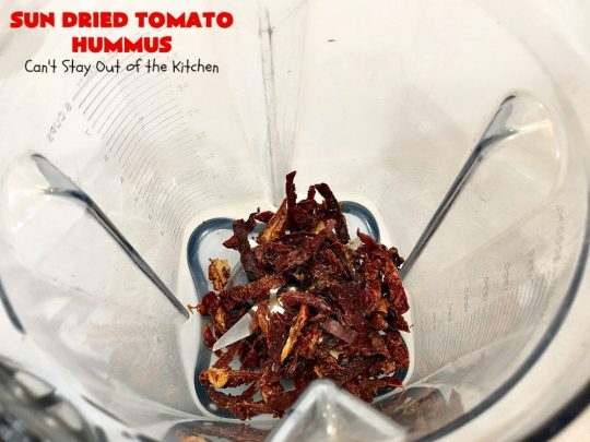 Sun Dried Tomato Hummus | Can't Stay Out of the Kitchen | this #hummus #recipe is fantastic! It includes #SunDriedTomatoes & just a little heat from cayenne pepper. This amazing #appetizer is healthy, low calorie, #GlutenFree & #vegan. Plus it can be whipped up in about 5 minutes! #tailgating #GarbanzoBeans #SunDriedTomatoHummus