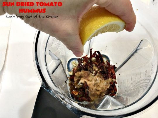 Sun Dried Tomato Hummus | Can't Stay Out of the Kitchen | this #hummus #recipe is fantastic! It includes #SunDriedTomatoes & just a little heat from cayenne pepper. This amazing #appetizer is healthy, low calorie, #GlutenFree & #vegan. Plus it can be whipped up in about 5 minutes! #tailgating #GarbanzoBeans #SunDriedTomatoHummus