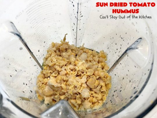Sun Dried Tomato Hummus | Can't Stay Out of the Kitchen | this #hummus #recipe is fantastic! It includes #SunDriedTomatoes & just a little heat from cayenne pepper. This amazing #appetizer is healthy, low calorie, #GlutenFree & #vegan. Plus it can be whipped up in about 5 minutes! #tailgating #GarbanzoBeans #SunDriedTomatoHummus