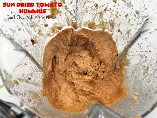 Sun Dried Tomato Hummus | Can't Stay Out of the Kitchen | this #hummus #recipe is fantastic! It includes #SunDriedTomatoes & just a little heat from cayenne pepper. This amazing #appetizer is healthy, low calorie, #GlutenFree & #vegan. Plus it can be whipped up in about 5 minutes! #tailgating #GarbanzoBeans #SunDriedTomatoHummus