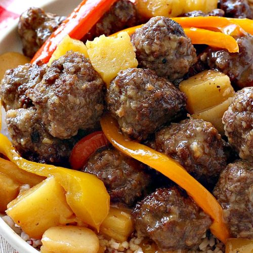 Sweet and Sour Meatballs | Can't Stay Out of the Kitchen | this #meatball entree is awesome! It's made with a delicious sweet & sour sauce & filled with bell peppers, #pineapple & water chestnuts. Served over #rice, this is the perfect weeknight meal. #beef #glutenfree