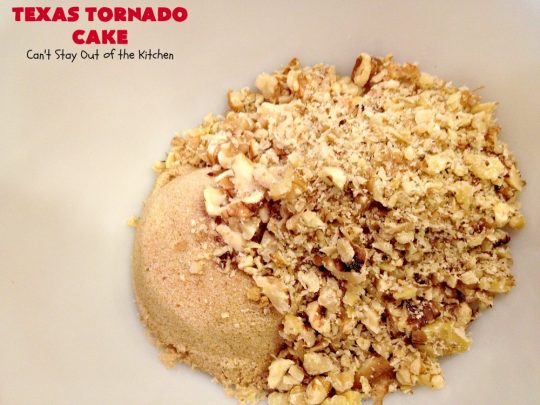 Texas Tornado Cake | Can't Stay Out of the Kitchen | this quick & easy #cake #recipe looks like a tornado hit it after baking! It's filled with #walnuts and #FruitCocktail. The #caramelized icing contains #coconut. This vintage cake will knock your socks off! #dessert #TexasTornadoCake #FruitCocktailCake #peaches #pears #EasyDessertRecipe #Holiday #HolidayDessert #ValentinesDay #ValentinesDayDessert