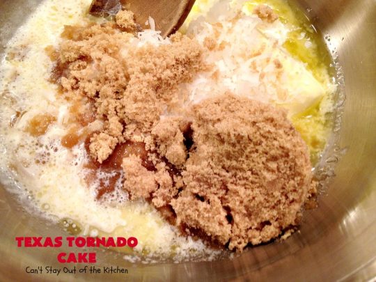 Texas Tornado Cake | Can't Stay Out of the Kitchen | this quick & easy #cake #recipe looks like a tornado hit it after baking! It's filled with #walnuts and #FruitCocktail. The #caramelized icing contains #coconut. This vintage cake will knock your socks off! #dessert #TexasTornadoCake #FruitCocktailCake #peaches #pears #EasyDessertRecipe #Holiday #HolidayDessert #ValentinesDay #ValentinesDayDessert