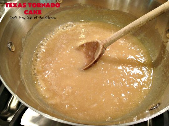 Texas Tornado Cake | Can't Stay Out of the Kitchen | this quick & easy #cake #recipe looks like a tornado hit it after baking! It's filled with #walnuts and #FruitCocktail. The #caramelized icing contains #coconut. This vintage cake will knock your socks off! #dessert #TexasTornadoCake #FruitCocktailCake #peaches #pears #EasyDessertRecipe #Holiday #HolidayDessert #ValentinesDay #ValentinesDayDessert