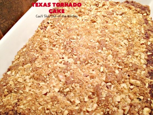 Texas Tornado Cake | Can't Stay Out of the Kitchen | this quick & easy #cake #recipe looks like a tornado hit it after baking! It's filled with #walnuts and #FruitCocktail. The #caramelized icing contains #coconut. This vintage cake will knock your socks off! #dessert #TexasTornadoCake #FruitCocktailCake #peaches #pears #EasyDessertRecipe #Holiday #HolidayDessert #ValentinesDay #ValentinesDayDessert