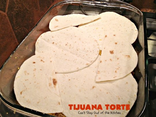 Tijuana Torte | Can't Stay Out of the Kitchen | this fabulous #TexMex #casserole is absolutely mouthwatering. It's layered with flour #tortillas, a #beef mixture & lots of #cheese. Terrific for company dinners. #CincoDeMayo