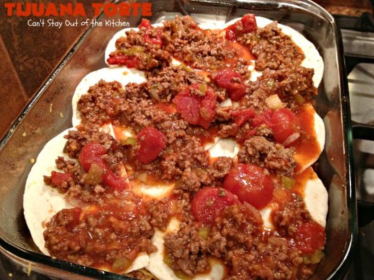 Tijuana Torte | Can't Stay Out of the Kitchen | this fabulous #TexMex #casserole is absolutely mouthwatering. It's layered with flour #tortillas, a #beef mixture & lots of #cheese. Terrific for company dinners. #CincoDeMayo