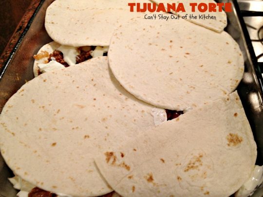 Tijuana Torte | Can't Stay Out of the Kitchen | this fabulous #TexMex #casserole is absolutely mouthwatering. It's layered with flour #tortillas, a #beef mixture & lots of #cheese. Terrific for company dinners. #CincoDeMayo