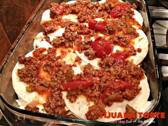Tijuana Torte | Can't Stay Out of the Kitchen | this fabulous #TexMex #casserole is absolutely mouthwatering. It's layered with flour #tortillas, a #beef mixture & lots of #cheese. Terrific for company dinners. #CincoDeMayo