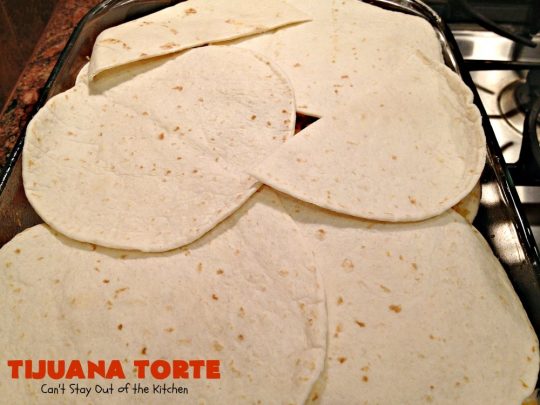 Tijuana Torte | Can't Stay Out of the Kitchen | this fabulous #TexMex #casserole is absolutely mouthwatering. It's layered with flour #tortillas, a #beef mixture & lots of #cheese. Terrific for company dinners. #CincoDeMayo