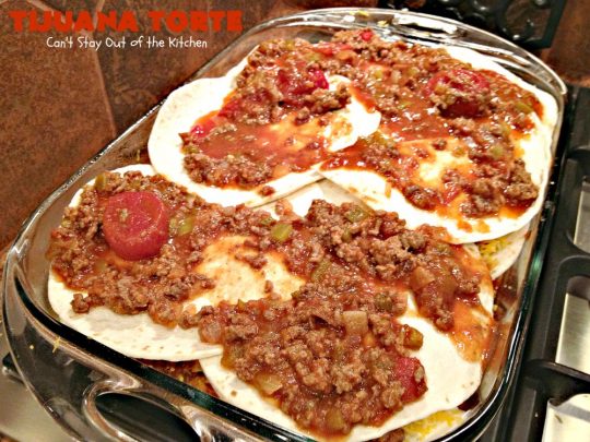 Tijuana Torte | Can't Stay Out of the Kitchen | this fabulous #TexMex #casserole is absolutely mouthwatering. It's layered with flour #tortillas, a #beef mixture & lots of #cheese. Terrific for company dinners. #CincoDeMayo