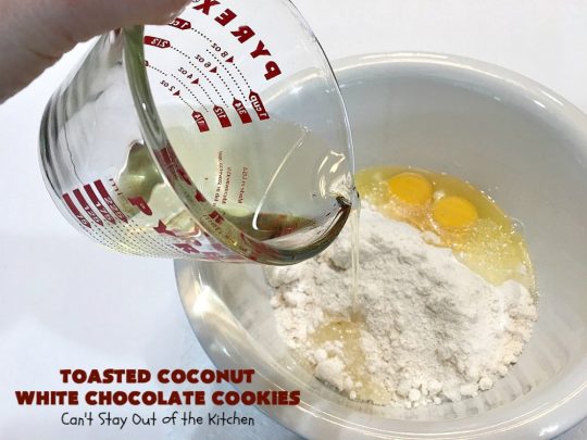 Toasted Coconut White Chocolate Cookies | Can't Stay Out of the Kitchen | these amazing #cookies use only 5 ingredients & start with a #CakeMix. They're perfect for #holiday #baking & a #ChristmasCookieExchange. If you need a quick & easy #dessert for the #Holidays, this is it! #coconut #chocolate #WhiteChocolateChips #ToastedCoconutWhiteChocolateCookies