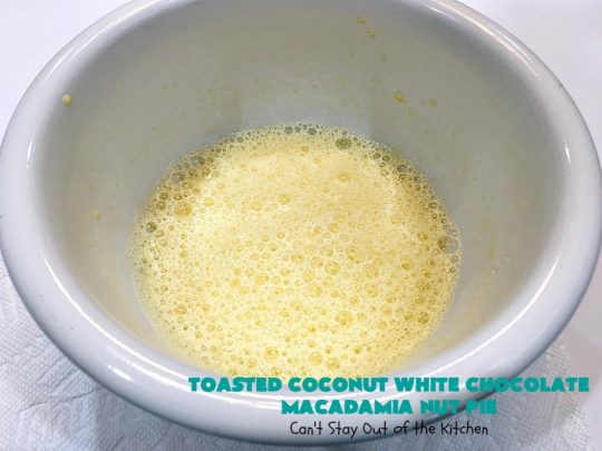 Toasted Coconut White Chocolate Macadamia Nut Pie | Can't Stay Out of the Kitchen | this heavenly #pie is rich, decadent & glorious! Every bite will have you drooling & wanting more. Perfect #dessert for #holiday #baking & parties. #coconut #MacadamiaNuts #chocolate #NewYearsDay #Christmas #HolidayDessert #WhiteChocolateChips#ToastedCoconutWhiteChocolateMacadamiaNutPie