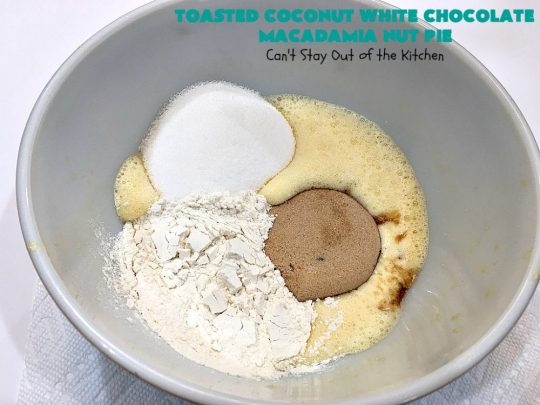 Toasted Coconut White Chocolate Macadamia Nut Pie | Can't Stay Out of the Kitchen | this heavenly #pie is rich, decadent & glorious! Every bite will have you drooling & wanting more. Perfect #dessert for #holiday #baking & parties. #coconut #MacadamiaNuts #chocolate #NewYearsDay #Christmas #HolidayDessert #WhiteChocolateChips#ToastedCoconutWhiteChocolateMacadamiaNutPie