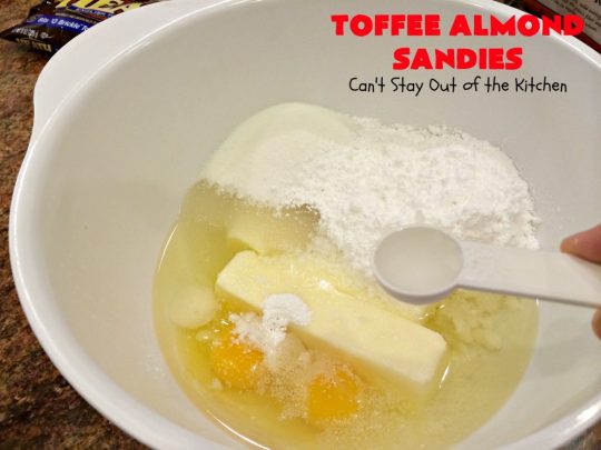 Toffee Almond Sandies | Can't Stay Out of the Kitchen | these irresistible #cookies are filled with #almonds & #HeathEnglishToffeeBits. They are absolutely mouthwatering & delightful for #holiday parties, #tailgating or #ChristmasCookieExchanges. Everyone raves over this amazing #dessert. #toffee #ToffeeAlmondSandies #ToffeeDessert #baking