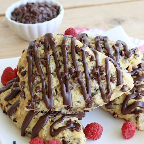 Toll House Scones | Can't Stay Out of the Kitchen | #TollHouseScones are some of the best #scones you'll ever eat. This drool-worthy #breakfast or #brunch entree is perfect for a weekend, company or #holiday breakfast. They're chocked full of #ChocolateChips & drizzled with #chocolate icing. Every bite will have you swooning! #TollHouse #HolidayBreakfast