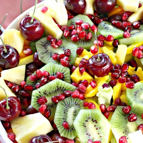 Tossed Salad with Tropical Fruit | Can't Stay Out of the Kitchen | This spectacular #salad is filled with #cherries #mangos #pineapple #kiwis & #pomegranates. Fantastic side dish for summer #holiday fun. #glutenfree #vegan
