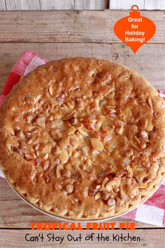 Tropical Fruit Pie | Can't Stay Out of the Kitchen | this amazing #pie contains #CandiedTropicalFruitMix, #almonds & vanilla chips. It absolutely explodes with flavor & is a terrific way to use #CandiedFruit in a #recipe. Great for #holiday #baking. #HolidayDessert #ParadiseFruitCompany #dessert #ParadiseCandiedFruit #papaya #mango #pineapple #TropicalFruitPie