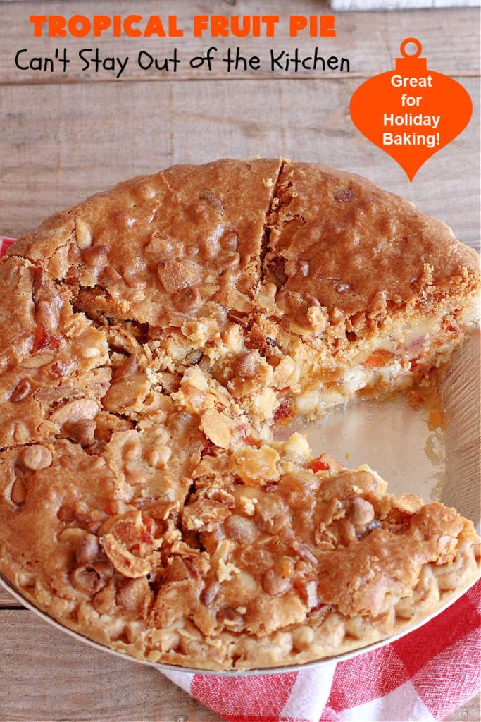 Tropical Fruit Pie | Can't Stay Out of the Kitchen | this amazing #pie contains #CandiedTropicalFruitMix, #almonds & vanilla chips. It absolutely explodes with flavor & is a terrific way to use #CandiedFruit in a #recipe. Great for #holiday #baking. #HolidayDessert #ParadiseFruitCompany #dessert #ParadiseCandiedFruit #papaya #mango #pineapple #TropicalFruitPie