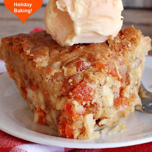 Tropical Fruit Pie | Can't Stay Out of the Kitchen | this amazing #pie contains #CandiedTropicalFruitMix, #almonds & vanilla chips. It absolutely explodes with flavor & is a terrific way to use #CandiedFruit in a #recipe. Great for #holiday #baking. #HolidayDessert #ParadiseFruitCompany #dessert #ParadiseCandiedFruit #papaya #mango #pineapple #TropicalFruitPie