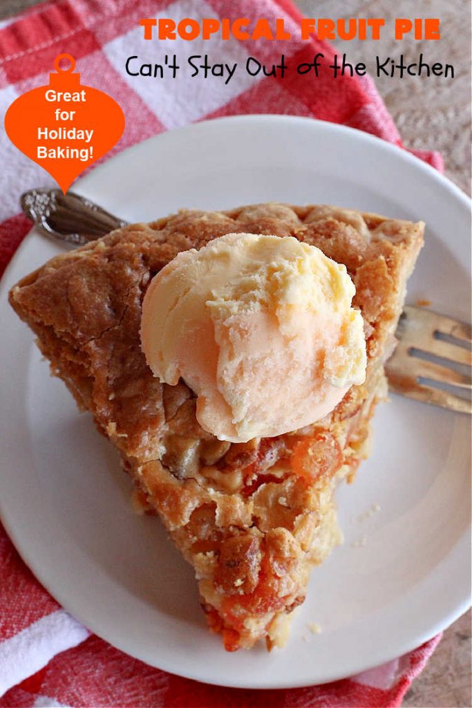 Tropical Fruit Pie | Can't Stay Out of the Kitchen | this amazing #pie contains #CandiedTropicalFruitMix, #almonds & vanilla chips. It absolutely explodes with flavor & is a terrific way to use #CandiedFruit in a #recipe. Great for #holiday #baking. #HolidayDessert #ParadiseFruitCompany #dessert #ParadiseCandiedFruit #papaya #mango #pineapple #TropicalFruitPie