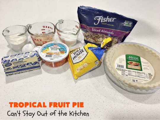 Tropical Fruit Pie | Can't Stay Out of the Kitchen | this amazing #pie contains #CandiedTropicalFruitMix, #almonds & vanilla chips. It absolutely explodes with flavor & is a terrific way to use #CandiedFruit in a #recipe. Great for #holiday #baking. #HolidayDessert #ParadiseFruitCompany #dessert #ParadiseCandiedFruit #papaya #mango #pineapple #TropicalFruitPie