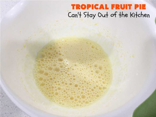 Tropical Fruit Pie | Can't Stay Out of the Kitchen | this amazing #pie contains #CandiedTropicalFruitMix, #almonds & vanilla chips. It absolutely explodes with flavor & is a terrific way to use #CandiedFruit in a #recipe. Great for #holiday #baking. #HolidayDessert #ParadiseFruitCompany #dessert #ParadiseCandiedFruit #papaya #mango #pineapple #TropicalFruitPie