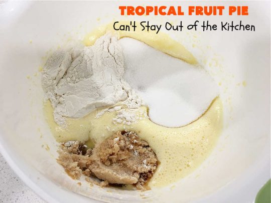 Tropical Fruit Pie | Can't Stay Out of the Kitchen | this amazing #pie contains #CandiedTropicalFruitMix, #almonds & vanilla chips. It absolutely explodes with flavor & is a terrific way to use #CandiedFruit in a #recipe. Great for #holiday #baking. #HolidayDessert #ParadiseFruitCompany #dessert #ParadiseCandiedFruit #papaya #mango #pineapple #TropicalFruitPie