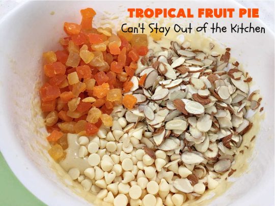 Tropical Fruit Pie | Can't Stay Out of the Kitchen | this amazing #pie contains #CandiedTropicalFruitMix, #almonds & vanilla chips. It absolutely explodes with flavor & is a terrific way to use #CandiedFruit in a #recipe. Great for #holiday #baking. #HolidayDessert #ParadiseFruitCompany #dessert #ParadiseCandiedFruit #papaya #mango #pineapple #TropicalFruitPie