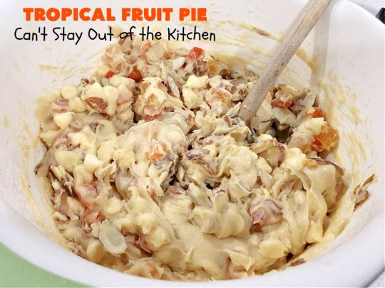 Tropical Fruit Pie | Can't Stay Out of the Kitchen | this amazing #pie contains #CandiedTropicalFruitMix, #almonds & vanilla chips. It absolutely explodes with flavor & is a terrific way to use #CandiedFruit in a #recipe. Great for #holiday #baking. #HolidayDessert #ParadiseFruitCompany #dessert #ParadiseCandiedFruit #papaya #mango #pineapple #TropicalFruitPie