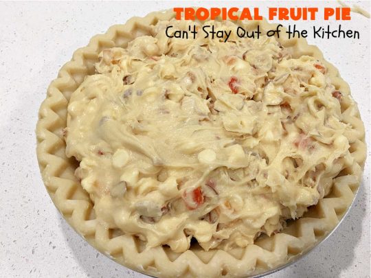 Tropical Fruit Pie | Can't Stay Out of the Kitchen | this amazing #pie contains #CandiedTropicalFruitMix, #almonds & vanilla chips. It absolutely explodes with flavor & is a terrific way to use #CandiedFruit in a #recipe. Great for #holiday #baking. #HolidayDessert #ParadiseFruitCompany #dessert #ParadiseCandiedFruit #papaya #mango #pineapple #TropicalFruitPie
