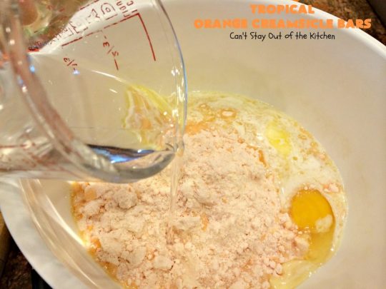 Tropical Orange Creamsicle Bars | Can't Stay Out of the Kitchen | these rich, decadent, heavenly #cookies use #OrangeCreamsicleCookieMix & frosting. They also have tropical #DriedFruits like #Mango, #papaya & #pineapple. #VanillaChips & #coconut make them so mouthwatering. Terrific #dessert for #Easter. #holiday #EasterDessert #MothersDay #MothersDayDessert #Tailgating #brownie #OrangeCreamsicle #TropicalOrangeCreamsicleBars #OrangeCreamsicleDessert