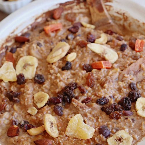 Tropical Trail Mix Overnight Oatmeal | Can't Stay Out of the Kitchen | this luscious #SteelCutOatmeal is fantastic for a family, company or #holiday #breakfast.The #TropicalTrailMix includes #raisins, #pineapple, #papaya, #bananas, #cashews #DriedCranberries & #almonds. Our favorite #Overnight#Oatmeal #recipe. #oatmeal #cinnamon #TropicalTrailMixOvernightOatmeal