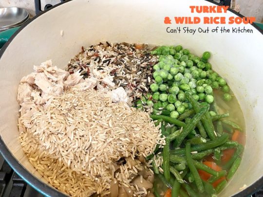 Turkey and Wild Rice Soup | Can't Stay Out of the Kitchen | this fantastic #soup is the perfect comfort food for the cold, dreary nights of winter. It will warm you up and put a smile on your face! #Turkey #TurkeySoup #TurkeyandWildRiceSoup #greenbeans #carrots #peas #WildRice #GlutenFree #mushrooms #Fall #FallSoupRecipe #GlutenFreeSoup #GlutenFreeTurkeySoup 
