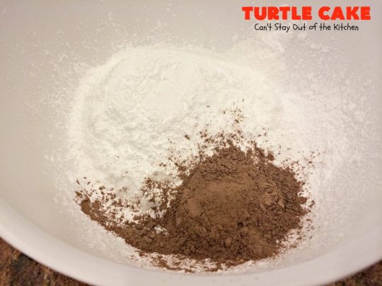 Turtle Cake | Can't Stay Out of the Kitchen | the richest, most decadent & divine #dessert ever! Tastes like eating #TurtleCandies but in #cake form. Uses #chocolate cake mix, #caramels melted with condensed milk, chocolate chips & pecans and topped with a luscious chocolate #marshmallow frosting. 