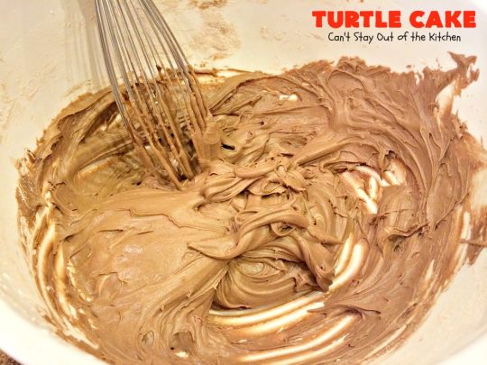Turtle Cake | Can't Stay Out of the Kitchen | the richest, most decadent & divine #dessert ever! Tastes like eating #TurtleCandies but in #cake form. Uses #chocolate cake mix, #caramels melted with condensed milk, chocolate chips & pecans and topped with a luscious chocolate #marshmallow frosting. 