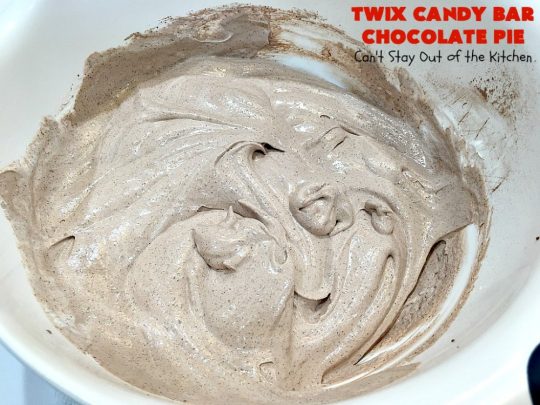 Twix Candy Bar Chocolate Pie | Can't Stay Out of the Kitchen | this luscious #ChocolatePie will rock your world! It uses only 5 ingredients including #TwixCandyBars! Amazing #dessert for #holidays or company. #pie #TwixCandyBarChocolatePie