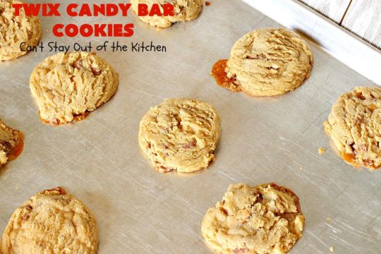Twix Candy Bar Cookies | Can't Stay Out of the Kitchen | these fantastic #cookies are to die for! They're filled with #TwixCandyBars so they have great #chocolate & #caramel taste. We gave them out for a local town Christmas celebration & hundreds of folks raved over these goodies. #dessert #Holiday #HolidayDessert #CaramelDessert #ChocolateDessert #TwixCandyBarDessert #TwixCandyBarCookies #ChristmasCookieExchange #tailgating