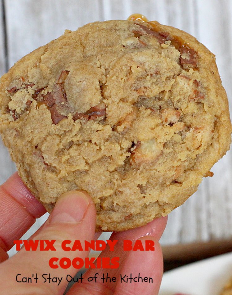 Twix Candy Bar Cookies | Can't Stay Out of the Kitchen | these fantastic #cookies are to die for! They're filled with #TwixCandyBars so they have great #chocolate & #caramel taste. We gave them out for a local town Christmas celebration & hundreds of folks raved over these goodies. #dessert #Holiday #HolidayDessert #CaramelDessert #ChocolateDessert #TwixCandyBarDessert #TwixCandyBarCookies #ChristmasCookieExchange #tailgating