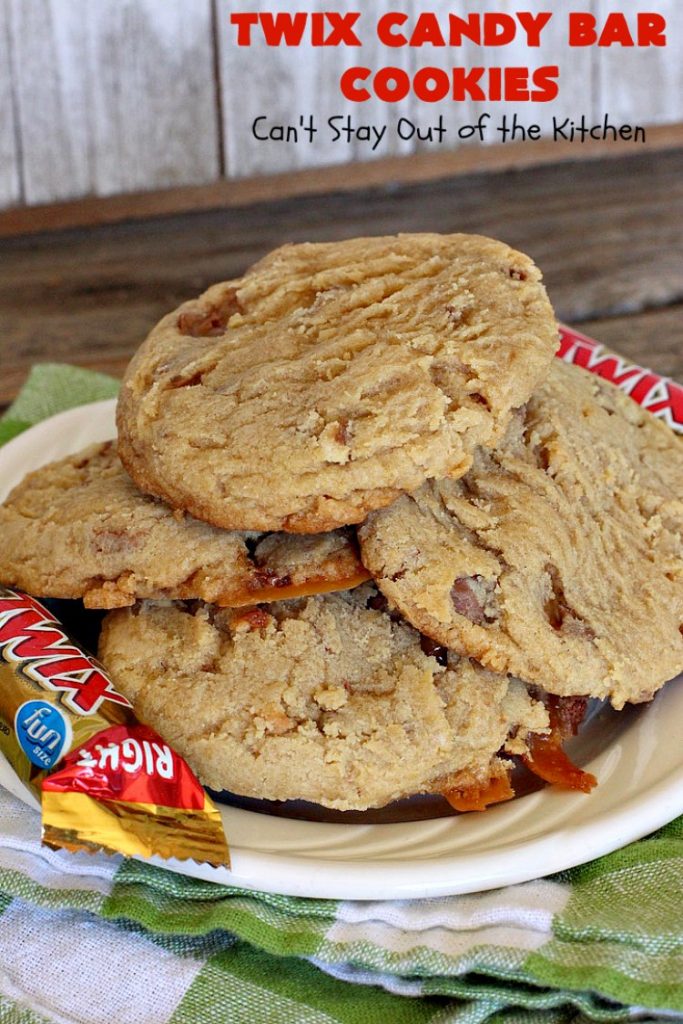 Twix Candy Bar Cookies | Can't Stay Out of the Kitchen | these fantastic #cookies are to die for! They're filled with #TwixCandyBars so they have great #chocolate & #caramel taste. We gave them out for a local town Christmas celebration & hundreds of folks raved over these goodies. #dessert #Holiday #HolidayDessert #CaramelDessert #ChocolateDessert #TwixCandyBarDessert #TwixCandyBarCookies #ChristmasCookieExchange #tailgating