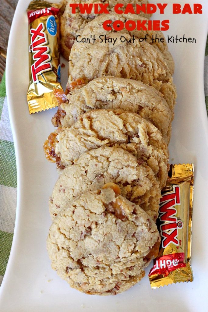 Twix Candy Bar Cookies | Can't Stay Out of the Kitchen | these fantastic #cookies are to die for! They're filled with #TwixCandyBars so they have great #chocolate & #caramel taste. We gave them out for a local town Christmas celebration & hundreds of folks raved over these goodies. #dessert #Holiday #HolidayDessert #CaramelDessert #ChocolateDessert #TwixCandyBarDessert #TwixCandyBarCookies #ChristmasCookieExchange #tailgating