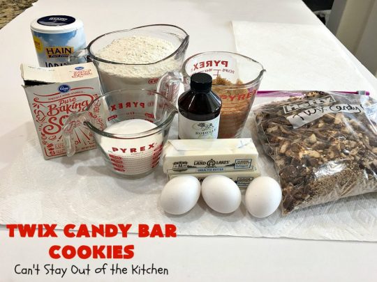 Twix Candy Bar Cookies | Can't Stay Out of the Kitchen | these fantastic #cookies are to die for! They're filled with #TwixCandyBars so they have great #chocolate & #caramel taste. We gave them out for a local town Christmas celebration & hundreds of folks raved over these goodies. #dessert #Holiday #HolidayDessert #CaramelDessert #ChocolateDessert #TwixCandyBarDessert #TwixCandyBarCookies #ChristmasCookieExchange #tailgating