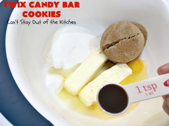 Twix Candy Bar Cookies | Can't Stay Out of the Kitchen | these fantastic #cookies are to die for! They're filled with #TwixCandyBars so they have great #chocolate & #caramel taste. We gave them out for a local town Christmas celebration & hundreds of folks raved over these goodies. #dessert #Holiday #HolidayDessert #CaramelDessert #ChocolateDessert #TwixCandyBarDessert #TwixCandyBarCookies #ChristmasCookieExchange #tailgating