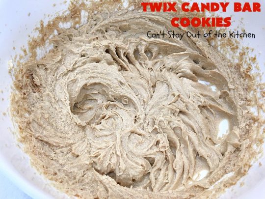 Twix Candy Bar Cookies | Can't Stay Out of the Kitchen | these fantastic #cookies are to die for! They're filled with #TwixCandyBars so they have great #chocolate & #caramel taste. We gave them out for a local town Christmas celebration & hundreds of folks raved over these goodies. #dessert #Holiday #HolidayDessert #CaramelDessert #ChocolateDessert #TwixCandyBarDessert #TwixCandyBarCookies #ChristmasCookieExchange #tailgating