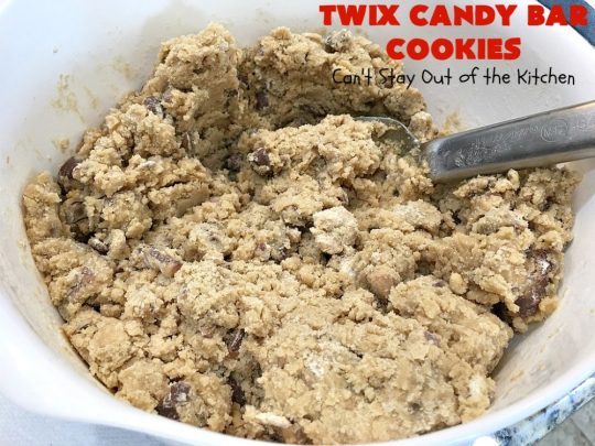 Twix Candy Bar Cookies | Can't Stay Out of the Kitchen | these fantastic #cookies are to die for! They're filled with #TwixCandyBars so they have great #chocolate & #caramel taste. We gave them out for a local town Christmas celebration & hundreds of folks raved over these goodies. #dessert #Holiday #HolidayDessert #CaramelDessert #ChocolateDessert #TwixCandyBarDessert #TwixCandyBarCookies #ChristmasCookieExchange #tailgating