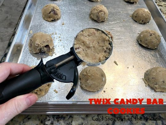 Twix Candy Bar Cookies | Can't Stay Out of the Kitchen | these fantastic #cookies are to die for! They're filled with #TwixCandyBars so they have great #chocolate & #caramel taste. We gave them out for a local town Christmas celebration & hundreds of folks raved over these goodies. #dessert #Holiday #HolidayDessert #CaramelDessert #ChocolateDessert #TwixCandyBarDessert #TwixCandyBarCookies #ChristmasCookieExchange #tailgating
