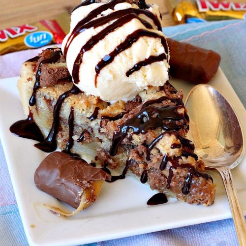 Twix Candy Bar Pie | Can't Stay Out of the Kitchen | this spectacular #pie will have you swooning from the first bite! It's filled with #TwixCandyBars so it's loaded with #chocolate & #caramel. Perfect #dessert for #ValentinesDay & other special occasions or #holidays. #ChocolateDessert #CaramelDessert #TwixCandyBarPie #TwixCandyBarDessert