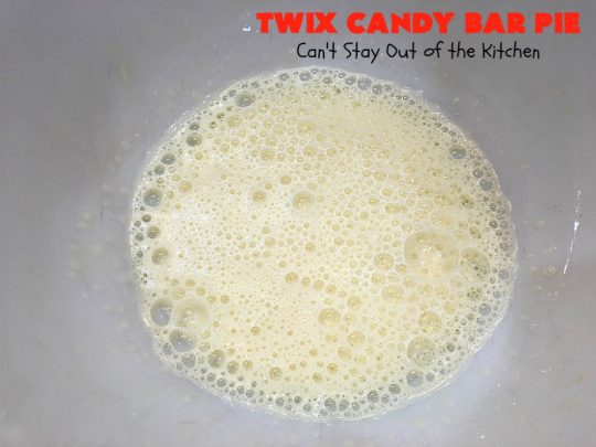 Twix Candy Bar Pie | Can't Stay Out of the Kitchen | this spectacular #pie will have you swooning from the first bite! It's filled with #TwixCandyBars so it's loaded with #chocolate & #caramel. Perfect #dessert for #ValentinesDay & other special occasions or #holidays. #ChocolateDessert #CaramelDessert #TwixCandyBarPie #TwixCandyBarDessert